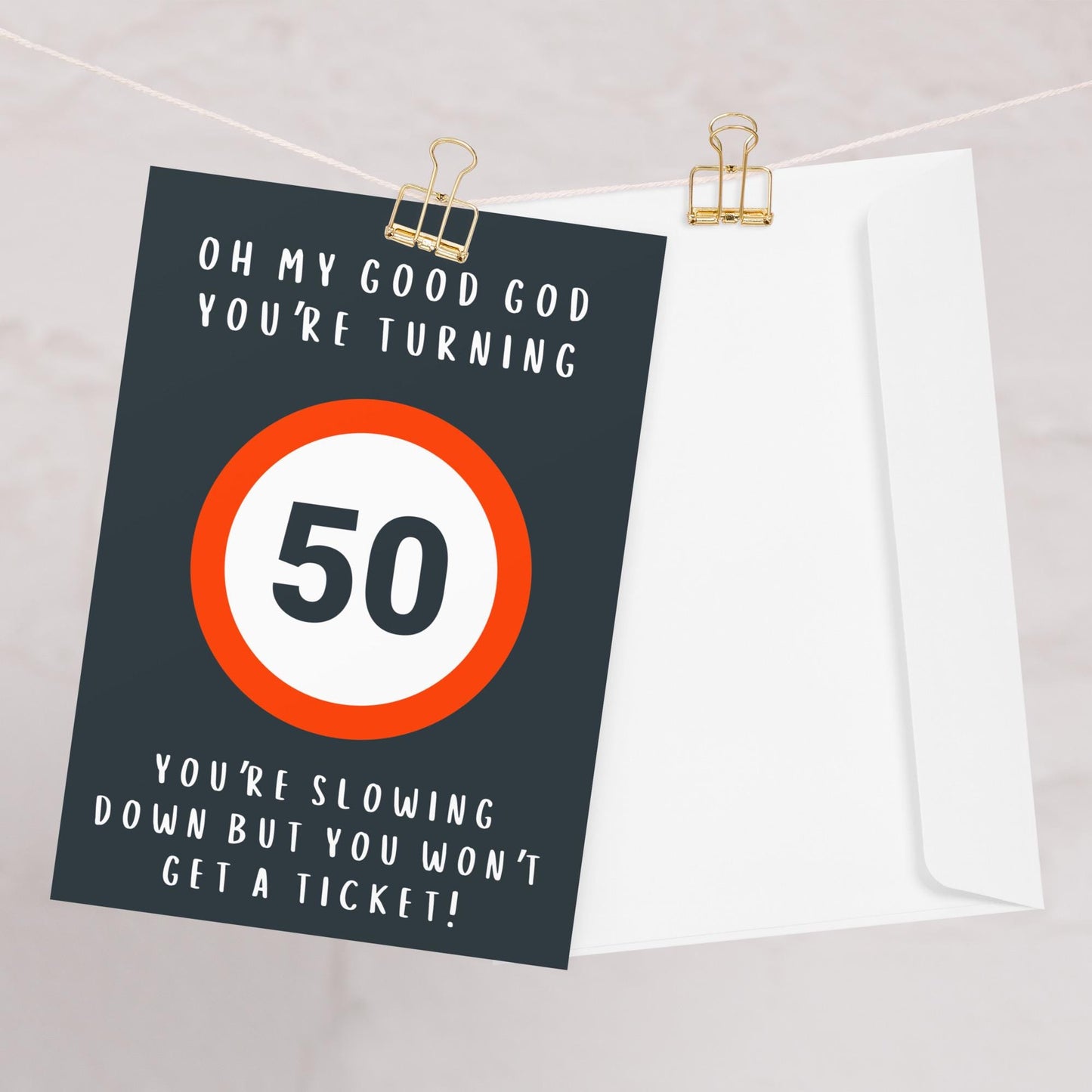 50th Birthday Card with Envelope Hanging on Wire